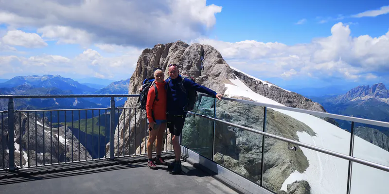 Hiking in the Italian Alps. On top of Punta Rocca (Marmolada, 3265m) after a hike across the Sella mountain plateau from Passo Gardena to Passo Pordoi.